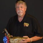 Bruce Urben, shown here with a winning decoy in Wisconsin’s 2018 Decoy Carving Contest